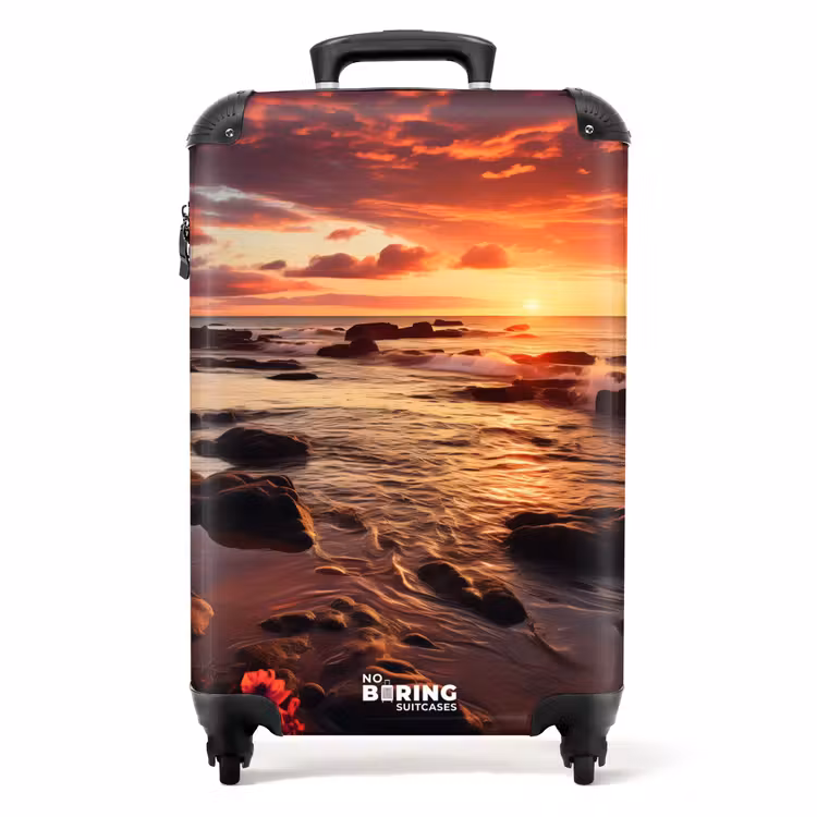 Koffer - Rotsachtig strand bij zonsondergang — 1
